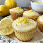 Fresh lemon cupcake recipe with buttercream frosting on kitchen table